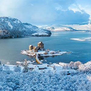Highland Region Prints: Snowy morning at Eilean Donan Castle on Loch Duich