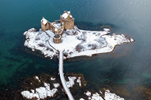 Scenic View Prints: Snowy morning at Eilean Donan Castle on Loch Duich