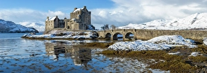 Scenic View Prints: Snowy morning at Eilean Donan Castle on Loch Duich