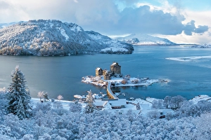 Scenic View Prints: Snowy morning at Eilean Donan Castle on Loch Duich
