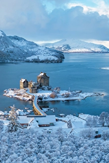 Highland Region Prints: Snowy morning at Eilean Donan Castle on Loch Duich
