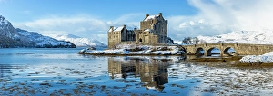 Highland Region Prints: Snowy morning at Eilean Donan Castle on Loch Duich