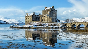 Highland Region Prints: Snowy morning at Eilean Donan Castle on Loch Duich