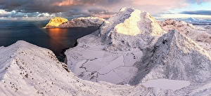 Finish Prints: Snowy mountain peaks and frozen beaches at dawn