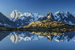 Sunrises Prints: Snowy peaks of Dent Du Geant and Grandes Jorasses are reflected in Lac Blanc, Haute Savoie