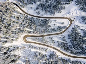 Panoramic View Prints: Snowy road aerial view, Passo Delle Erbe, Funes Valley, South Tyrol, Italy