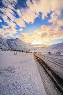 Cloudscape Prints: Empty snowy road leading to Ersfjorden, Troms og Finnmark, Norway