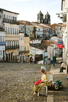 South America, Brazil, Bahia, a Baiana woman looking out over the Pelourinho in