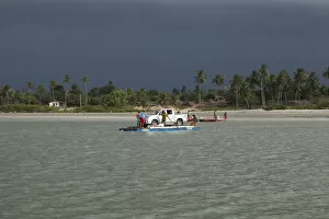 Images Dated 6th September 2012: South America, Brazil, Ceara, Camocim, storm clouds over the ferry rafts at Guriu