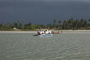 Images Dated 6th September 2012: South America, Brazil, Ceara, Camocim, storm clouds over the ferry rafts at Guriu