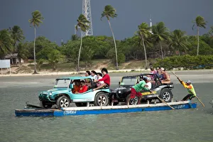Images Dated 6th September 2012: South America, Brazil, Ceara, Camocim, storm clouds over the ferry rafts at Guriu near Jericoacoara