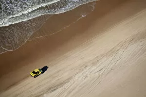 Images Dated 6th September 2012: South America, Brazil, Ceara, Fortaleza, Aerial view of a yellow beach buggy driving