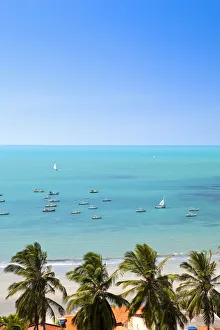 South America, Brazil, Ceara, Ponta Grossa, view of jangadas moored on an aquamarine