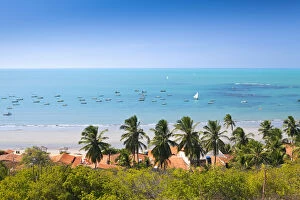 South America, Brazil, Ceara, Ponta Grossa, view of jangadas moored on an aquamarine