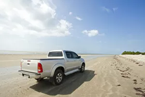 South America, Brazil, Ceara, Toyota Hilux 4x4 on the beach between Camocim