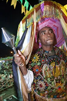 Images Dated 10th September 2012: South America, Brazil, Maranhao, Sao Luis, a costumed dancer with a percussion instrument
