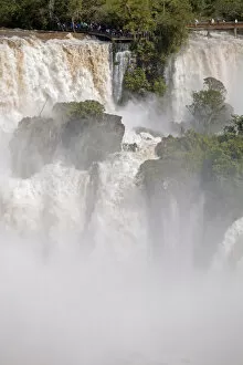 Images Dated 28th November 2012: South America, Brazil, Parana, a viewing platform at the Iguazu falls in full flood