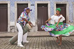 Dance Prints: South America, Brazil, a tambor drummer and dancer from the Tambor de Crioula group