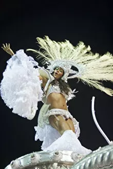 Images Dated 20th September 2012: South America, Rio de Janeiro, Rio de Janeiro city, costumed dancer in a headdress