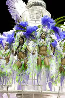 Images Dated 20th September 2012: South America, Rio de Janeiro, Rio de Janeiro city, costumed dancers wearing feathers