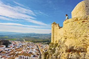 Spain, Andalucia, Cadiz province, Olvera, Woman looking out from Olvera Castle (MR)