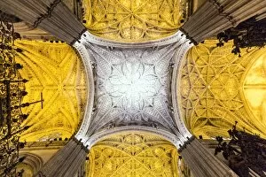 Images Dated 7th August 2014: Spain, Andalusia, Seville. Ornate ceiling inside the Cathedral of Saint Mary of the See