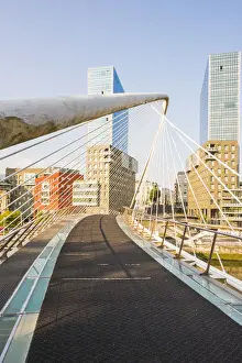 Spain, Basque Country, Bilbao. Zubizuri bridge (White Bridge) across the Nervion River
