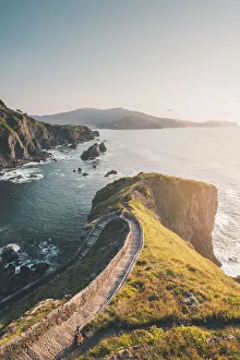 Spain, Basque Country, Gaztelugatxe. Walkway to the hermitage at sunset