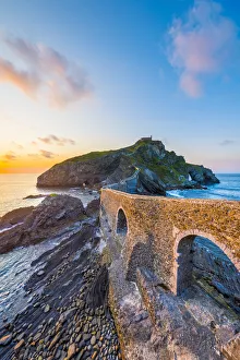 Spain, Basque Country, Gaztelugatxe. Walkway to the hermitage at sunset