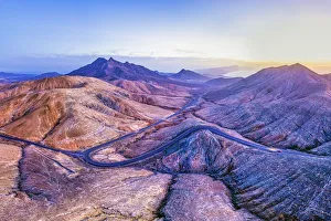 Images Dated 24th March 2020: Spain, Canary Islands, Fuerteventura, mountain road crossing the volcanic landscape near