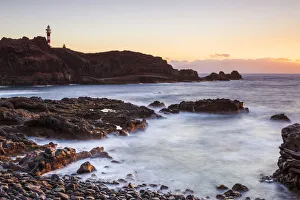 Spain, Canary Islands, Tenerife, Punta Teno lighthouse at sunset