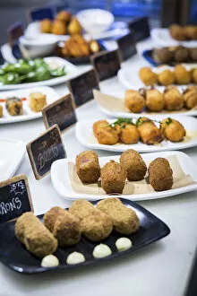 Images Dated 28th February 2022: Spain, Catalonia, Barcelona, Princesa Market, Different types of croquette on the entrance counter