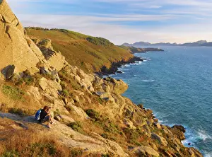 Galicia Prints: Spain, Galicia, Cangas, Man photographing view (MR)