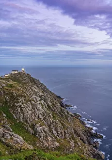 Spain, Galicia, Finisterre, Finisterre lighthouse at dusk