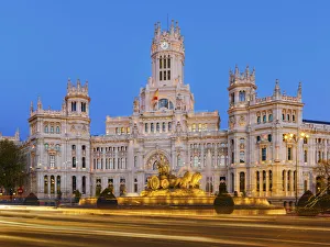 Spain, Madrid. Plaza de Cibeles and town hall at dusk