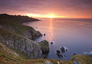 Images Dated 25th February 2015: Spectacular sunrise behind Start Point Lighthouse in South Hams, Devon, England. Autumn