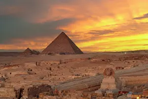 Archaeological Site Prints: The Sphinx and Giza pyramids at sunset, Cairo, Egypt