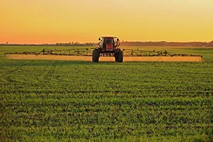 Manitoba Prints: Spraying an early crop growth Dugald, Manitoba, Canada