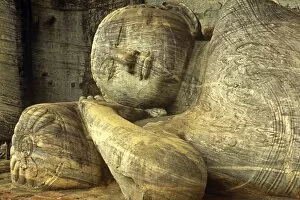 Images Dated 13th January 2011: Sri Lanka, Polonnaruwa, Gal Vihara. A celebrated 14-metre long recumbent Buddha statue lies in