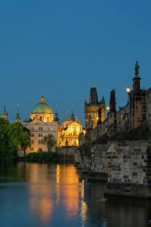 Images Dated 14th July 2023: St. Francis Of Assisi Church and Old Town Bridge Tower at Charles Bridge at twilight, Prague