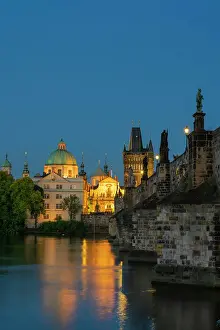 Ceska Republika Prints: St. Francis Of Assisi Church and Old Town Bridge Tower at Charles Bridge at twilight