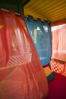 St. Kitts and Nevis, Nevis, Pinneys Beach, beach lounge with curtains