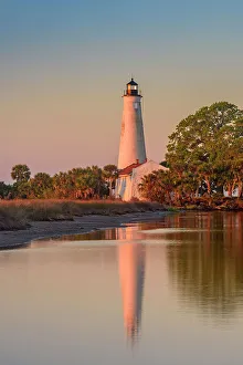 Florida Panhandle Prints: St. Marks Lighthouse reflected in a slough at dawn, St. Marks NWR, Florida, USA