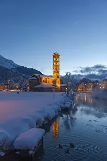 Images Dated 10th April 2015: St. Moritz church lights at dusk with pristine snow. Engadine, Switzerland, Europe