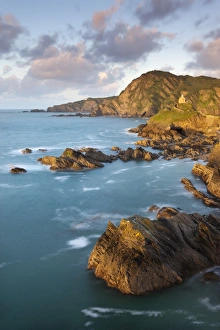 St Nicholas Chapel and Beacon Point on the rocky coast of Ilfracombe, Devon, England St Nicholas Chapel and Beacon Point on the rocky coast of Ilfracombe, Devon, England