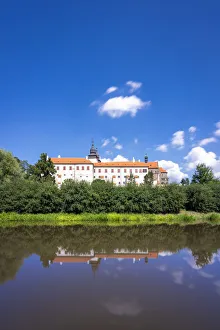 St. Procopius Basilica reflecting in Jihlava River on sunny day, UNESCO, Trebic St. Procopius Basilica reflecting in Jihlava River on sunny day, UNESCO, Trebic