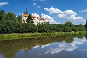 St. Procopius Basilica reflecting in Jihlava River on sunny day, UNESCO, Trebic