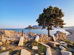St. Stefanos Basilica Ruins and Kastri Island at sunset, Agios Stefanos Beach, Kos Island, Dodecanese, Greece