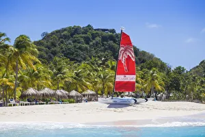 St Vincent and The Grenadines, Palm Island, Catamarans on beach