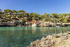 Cove Prints: Stairs lead into the ocean at a cove (Cala) in Mallorca, Spain
